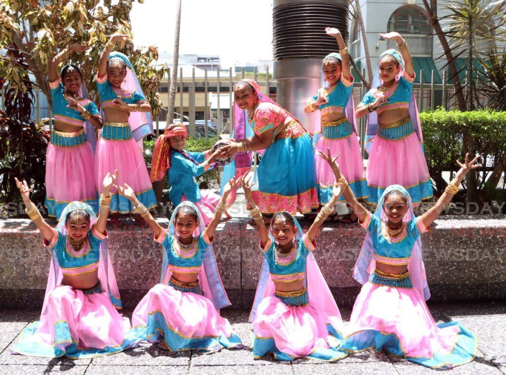 Dancers from Parvati Girls' Hindu College pose at Indian Arrival Day celebrations held by the Minstry of Education on May 24.