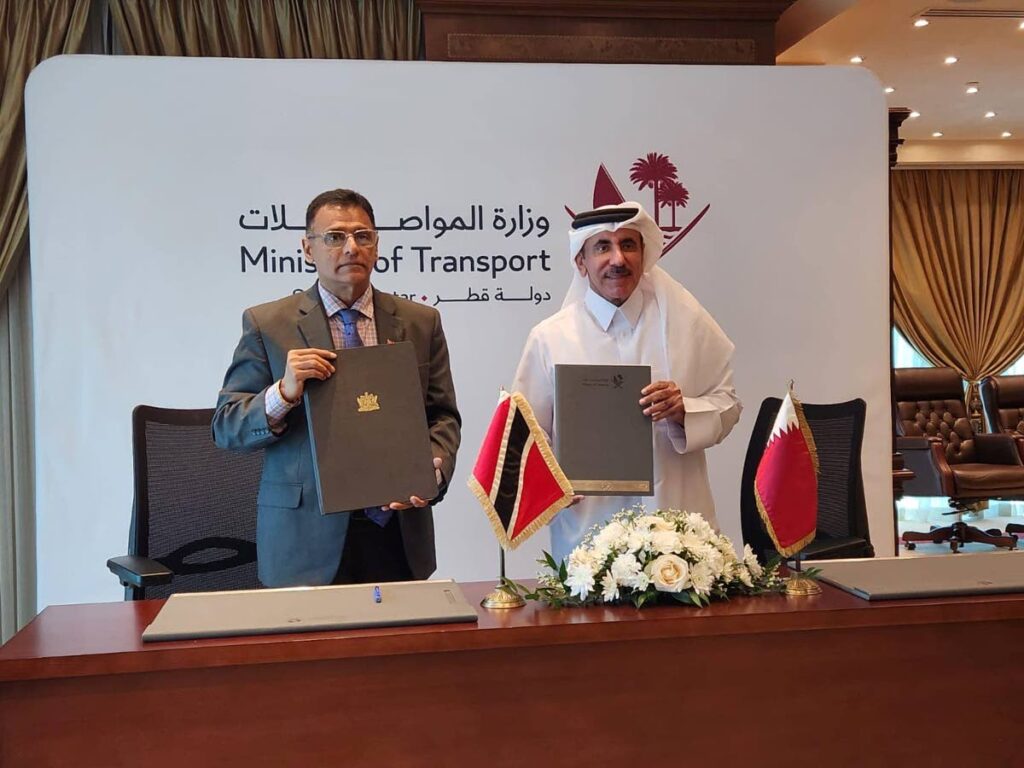 Minister of Works and Transport Rohan Sinanan, left, and Jassim Saif Al Sulaiti, Qatar's Minister of Transport, at the signing of a bilateral air services agreement between the two states in Doha, Qatar, on May 23. - Photo courtesy Ministry of Works and Transport 