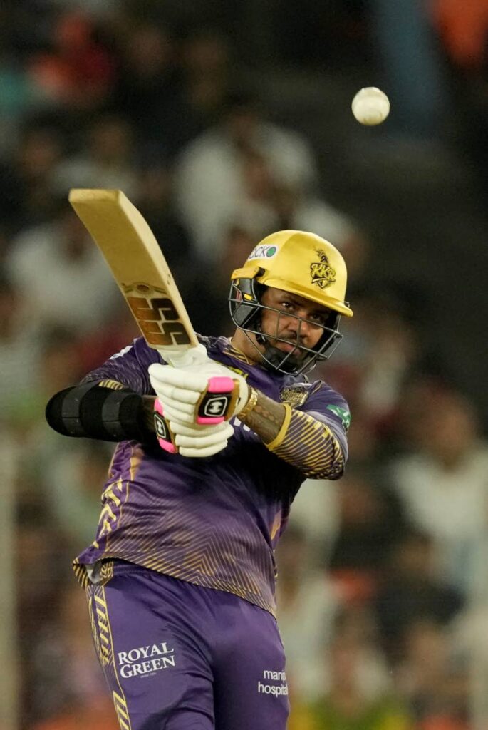 Kolkata Knight Riders' Sunil Narine plays a shot during the Indian Premier League qualifier cricket match between Kolkata Knight Riders and Sunrisers Hyderabad in Ahmedabad, India, on May 21, 2024. (AP Photo) - 