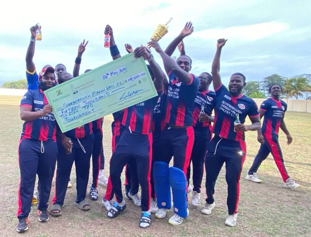 Scarborough/Mason Hall Cricket Club celebrate with their $15,000 cheque after defeating Bago Gladiators in the Tobago Cricket Association T20 final on May 26. Photo courtesy Marcus Daniel.  - 