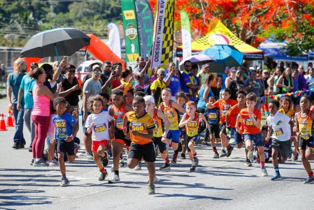 Participants compete at the Super Sprint Duathlon Junior event at Diego Martin Highway on Sunday. - courtesy Richard Lyder