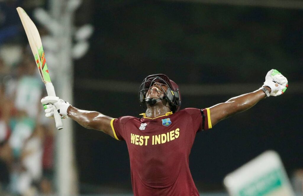 West Indies batsman Carlos Brathwaite celebrates after hitting a six to beat England in the final of the ICC World Twenty20 2016 tournament at Eden Gardens in Kolkata, India.  AP PHOTO - AP