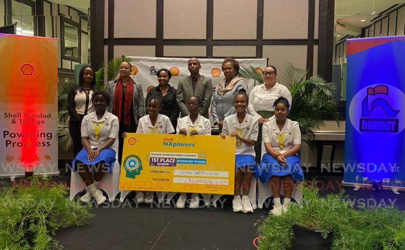 Corpus Christi College students, first place winners of Shell TT's NXplorers programme, pose with officials from Shell TT, Niherst and Ministry of Education at the award ceremony on May 9. - Photo by Sunshine Arthur