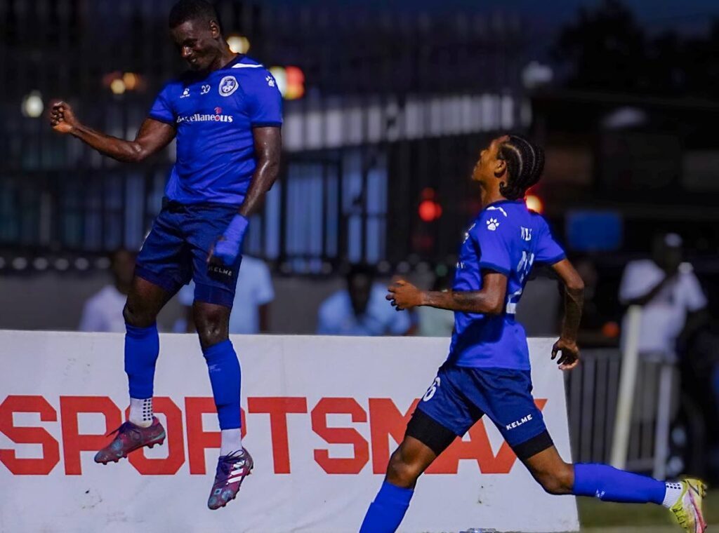 In this file photo, Miscellaneous Police FC attacker Kareem Freitas (L) celebrates a goal with his teammate Josiah Wilson in their 4-1 TTPFL win over Terminix La Horquetta Rangers at the St James Police Barracks. Photo courtesy TTPFL.  - 