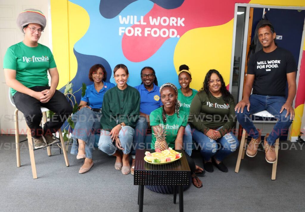 D'MARKET MOVERS TEAM: Chef Gerard Marquez, left; Sales and export manager Gabriella Gonzales; CEO Rachael Rennie; Mary Pierre; Yahannah Williams-Rostant; Andrea Kassinath-Ramnath and Ravi Renie; at the Cyrus Trace, El Soccorro store. - Photo by Angelo Marcelle