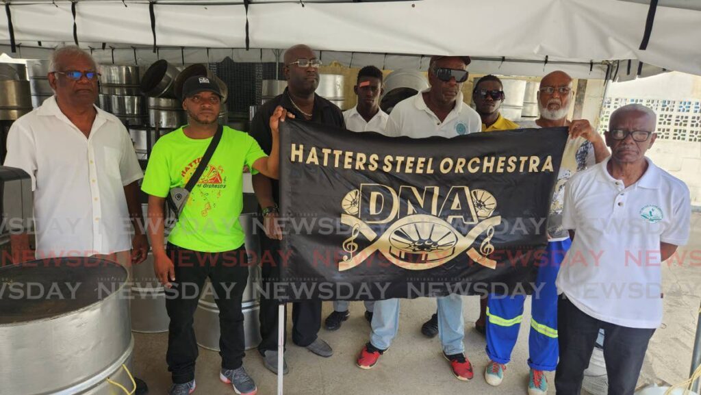 Members of the Hatters Steel Orchestra speak to the media at the band’s temporary home at the old Ministry of Works compound at Lady Hailes Avenue, San Fernando on May 29.
 - Photo by Yvonne Webb