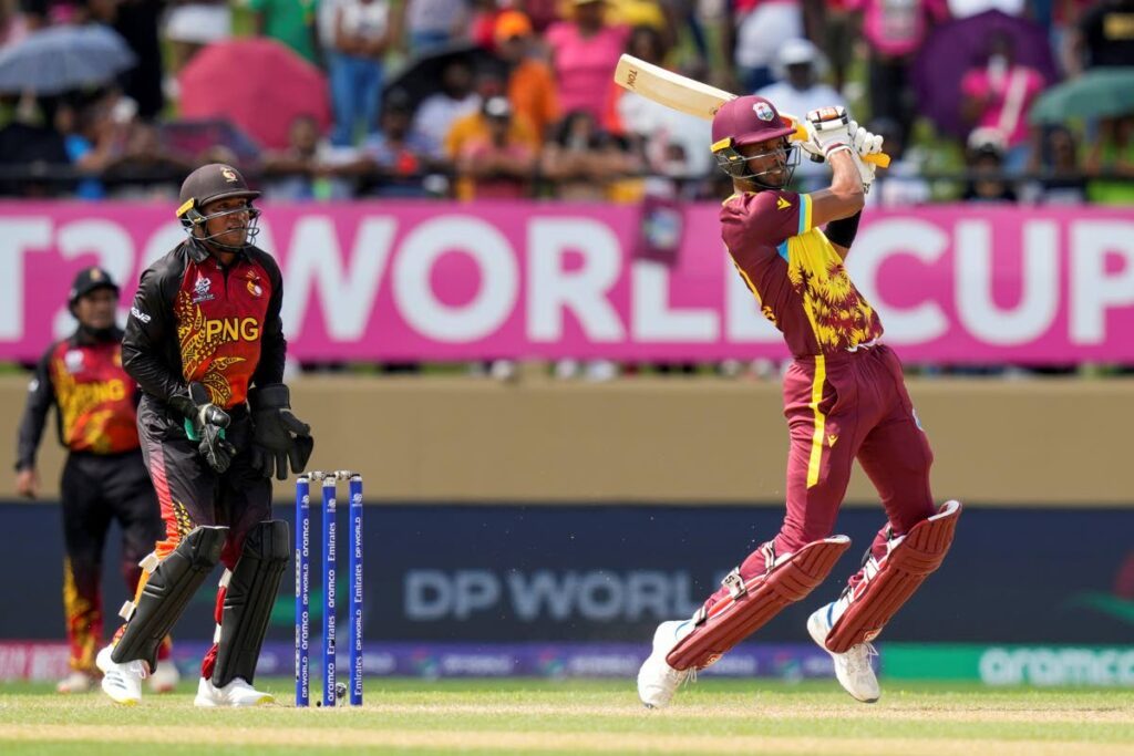 West Indies' Roston Chase plays a shot against Papua New Guinea during an ICC Men's T20 World Cup cricket match at Guyana National Stadium in Providence, Guyana, Sunday, June 2, 2024.  - AP