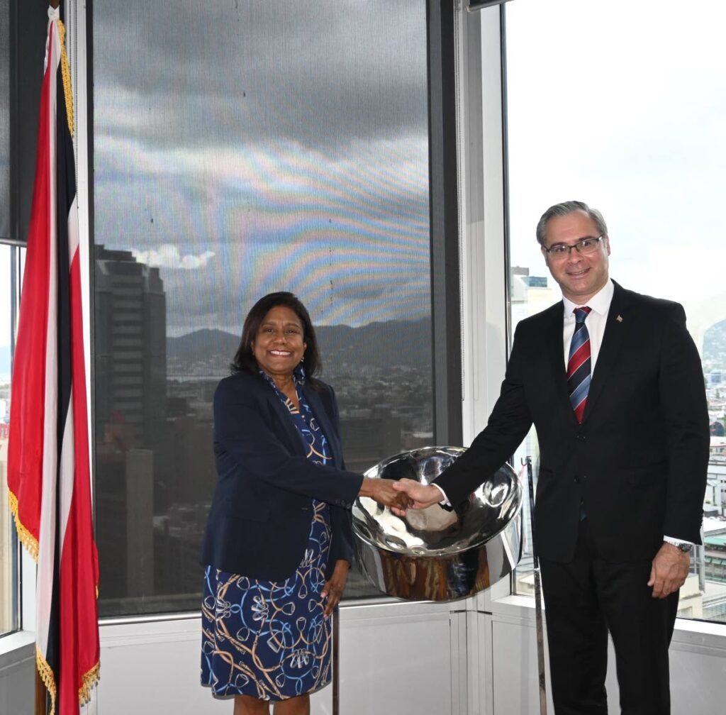 Trade Minister Paula Gopee-Scoon, left, shakes hands with Azerbaijan ambassador Rashad Intigam Oglu Novruz at the ministry office in Port of Spain, on June 4.
Photo courtesy MTI - 