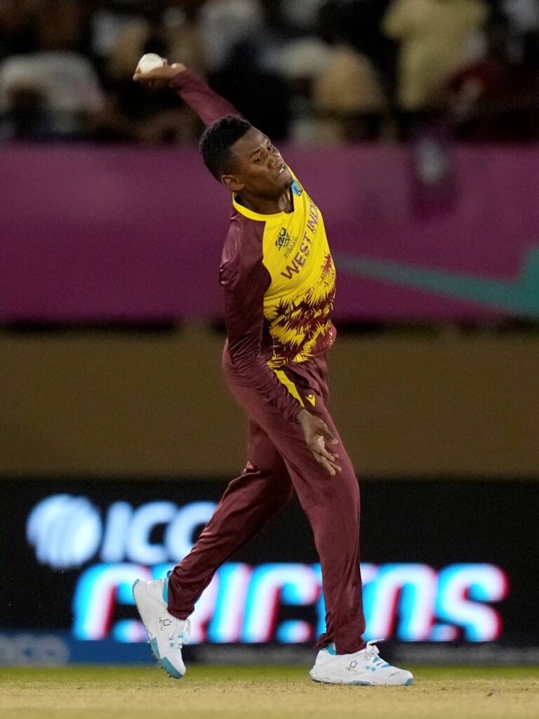 West Indies spinner Akeal Hosein bowls against Uganda during an ICC Men’s T20 World Cup match at Guyana National Stadium in Providence, Guyana on Saturday. - AP photo