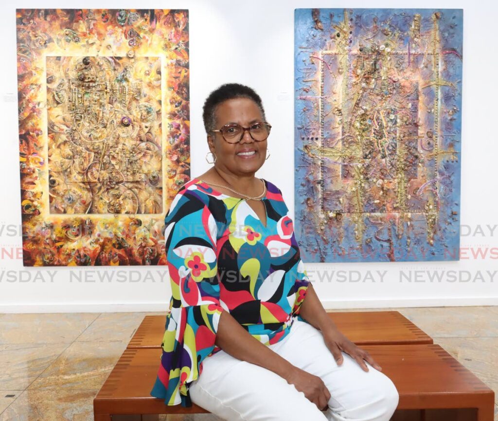 Angela Roopchand, wife of late artist Glenn Roopchand, at the art exhibition  Repatriation – A New Beginning at the Central Bank Museum, St Vincent Street, Port of Spain,on June 6. The exhibition continues until June 14. - Faith Ayoung