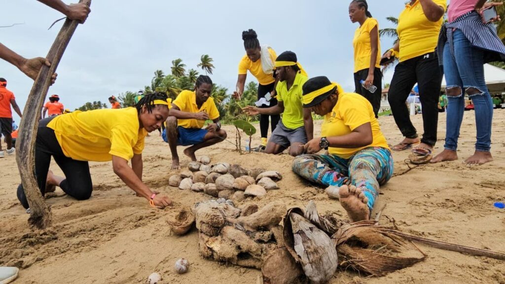 Members of the Good News Youth Club participate in a sand sculpting exercise at the Beach Cleanup Games on Sunset Beach in Mayaro on June 8. - Photo courtesy Oliviaevents2023.  