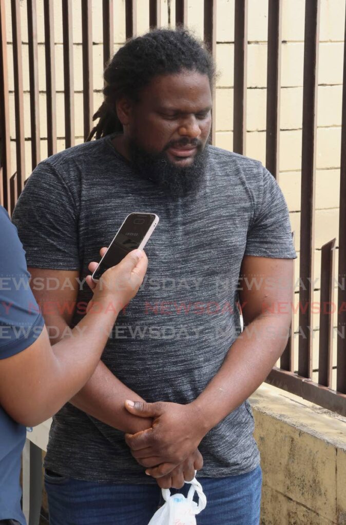 GRIEF STRICKEN: Andy Lashley, father of slain 15-year-old Christian Lashley, speaks to Newsday about his son's death at the Forensic Science Centre, St James on Tuesday. Christian was stabbed and killed in what police have described as a 