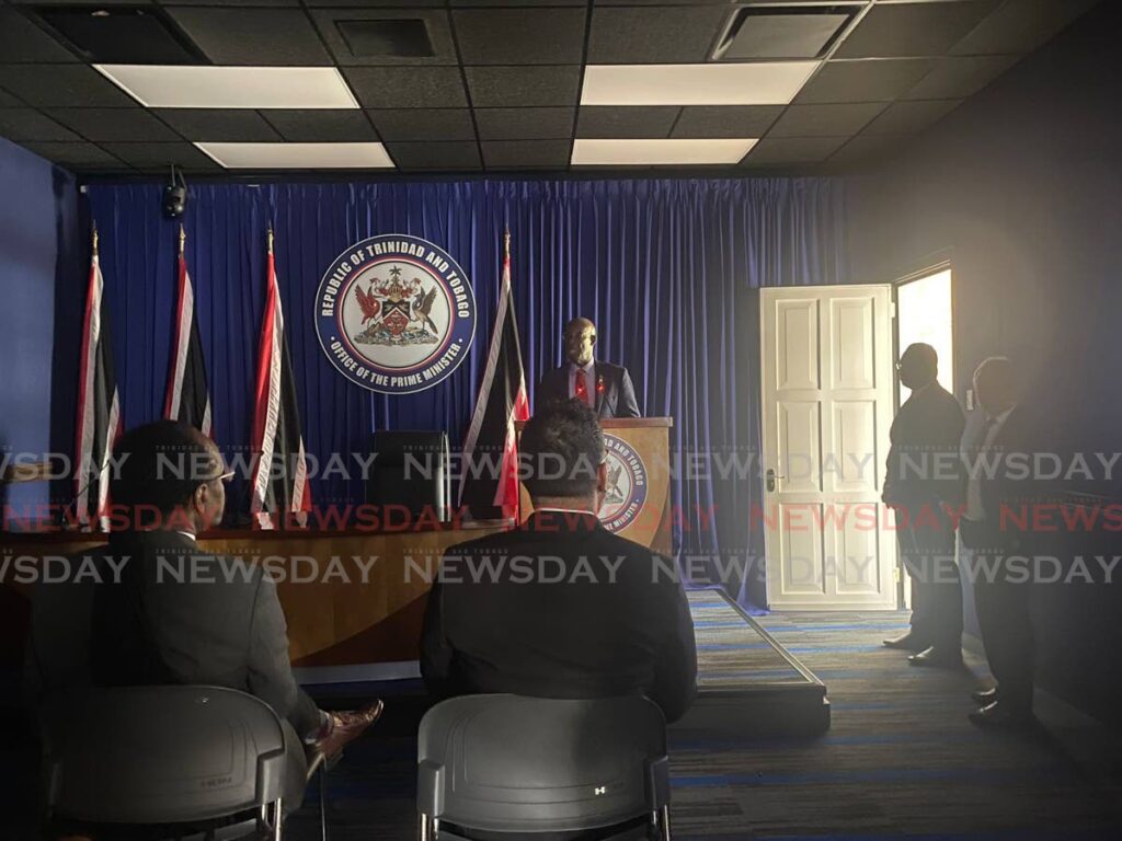 Prime Minister Dr Keith Rowley after there was a power cut during a post-Cabinet press conference at Whitehall on June 13.  - Photo by Narissa Fraser 