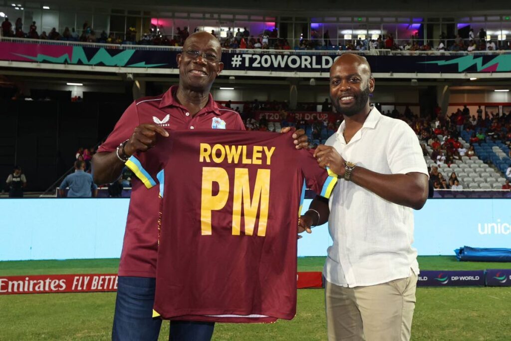 Trinidad and Tobago Prime Minister Dr Keith Rowley, left, is presented with a West Indies cricket team shirt from the Cricket West Indies president Dr Kishore Shallow during the ICC T20 World Cup match between New Zealand and the West Indies, at the Brian Lara Cricket Academy, Tarouba, on June 12, 2024.  - Photo courtesy CWI Media