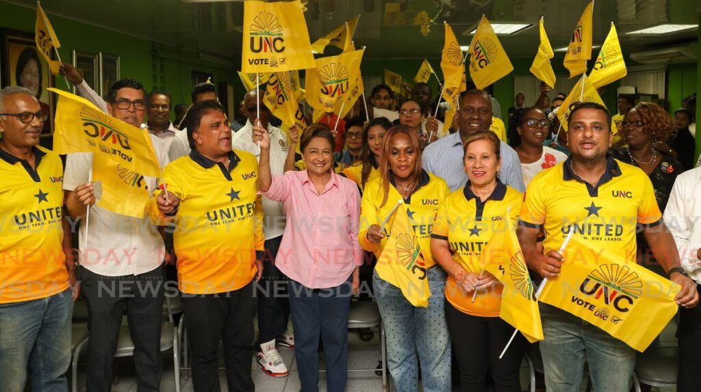 Opposition Leader Kamla Persad-Bissessar, centre, celebrates with the Star Team at her constituency office in Penal on June 15 as the party’s internal elections results were announced. The Star team got 213,651 votes to the Patriots 62,186 votes. - Photo by Venessa Mohammed
