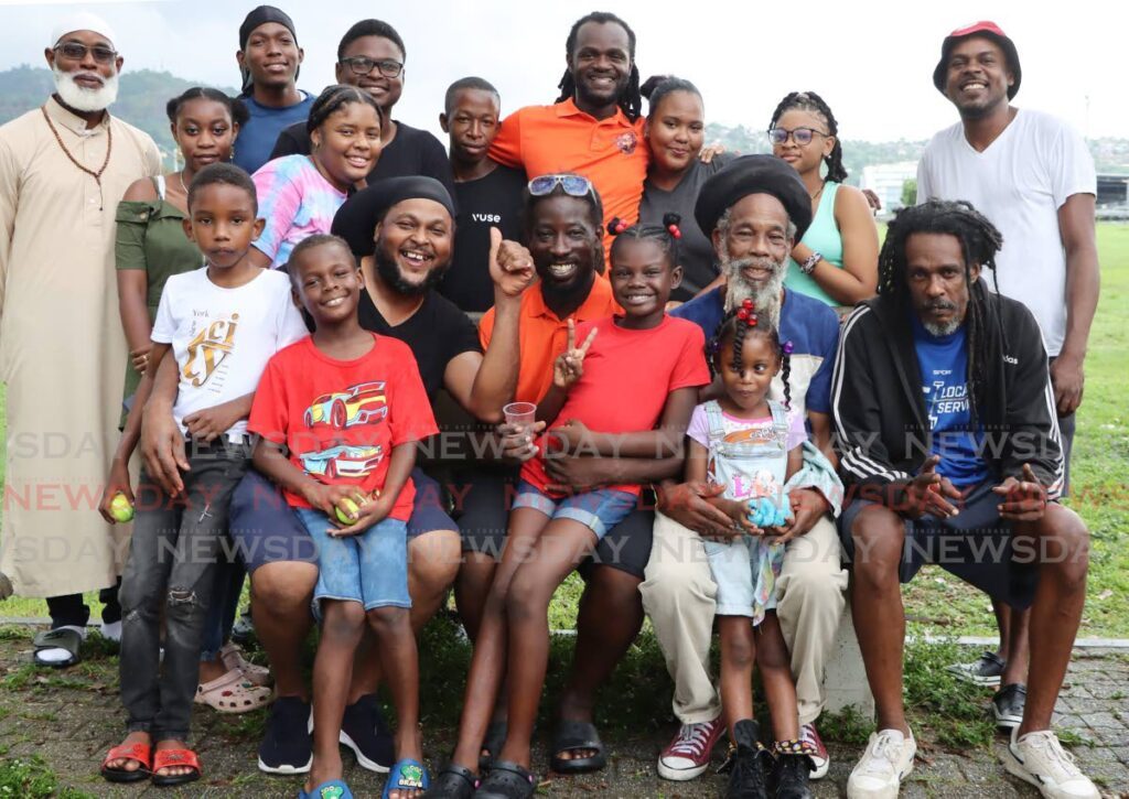 Fathers of the Shrine of Wisdom Knowledge and Understanding celebrate Father's Day with their children at the Queen's Park Savannah, Port of Spain - Photo by Ayanna Kinsale