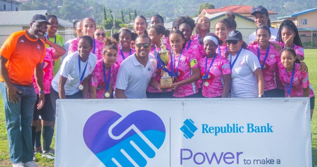 Pro Series' girls' under-20 football team celebrate after clinching the Republic Cup National Youth Football League Champions of Champions title at the Republic Bank Sports Club, Barataria on June 15. Photo courtesy 12 Media Productions.  - 