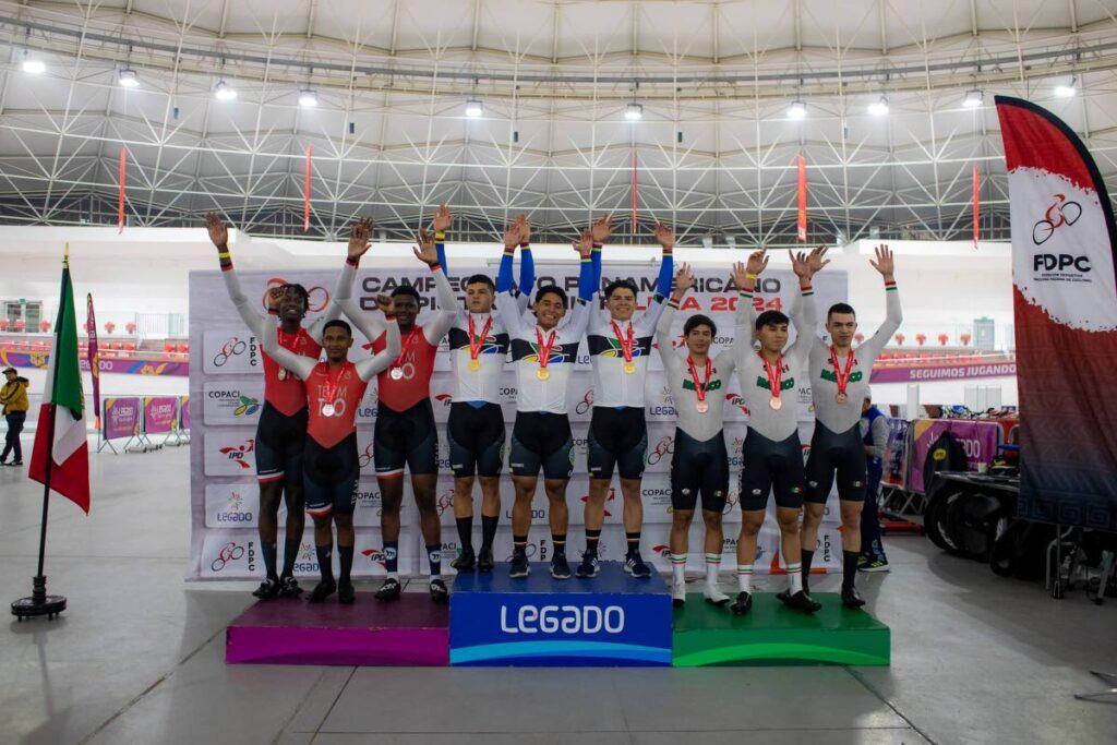 Trinidad and Tobago's junior team sprint team, left, celebrate their silver medal finish at the Jr Pan Am Cycling Champs in Lima, Peru, on June 19. Colombia, centre, won gold, while Mexico took bronze.  - DIEGO TRESIERRA