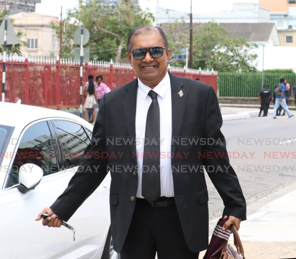 Opposition UNC MP for Cumuto/Manzanilla Dr Rai Ragbir smiles as he arrives for the sitting of the Lower House, at the Red House on June 21. - Photo by Faith Ayoung