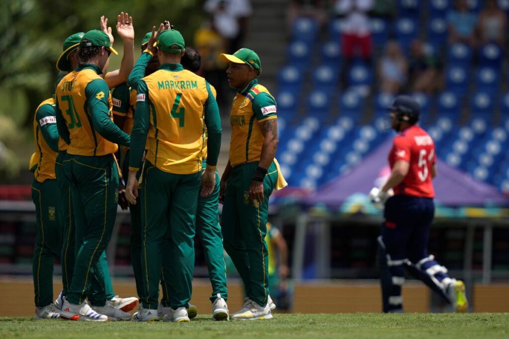 South Africa players celebrate the dismissal of England’s Jonny Bairstow (R) during the ICC Men’s T20 World Cup match at the Darren Sammy National Cricket Stadium in Gros Islet, St Lucia, on Friday. - AP PHOTO