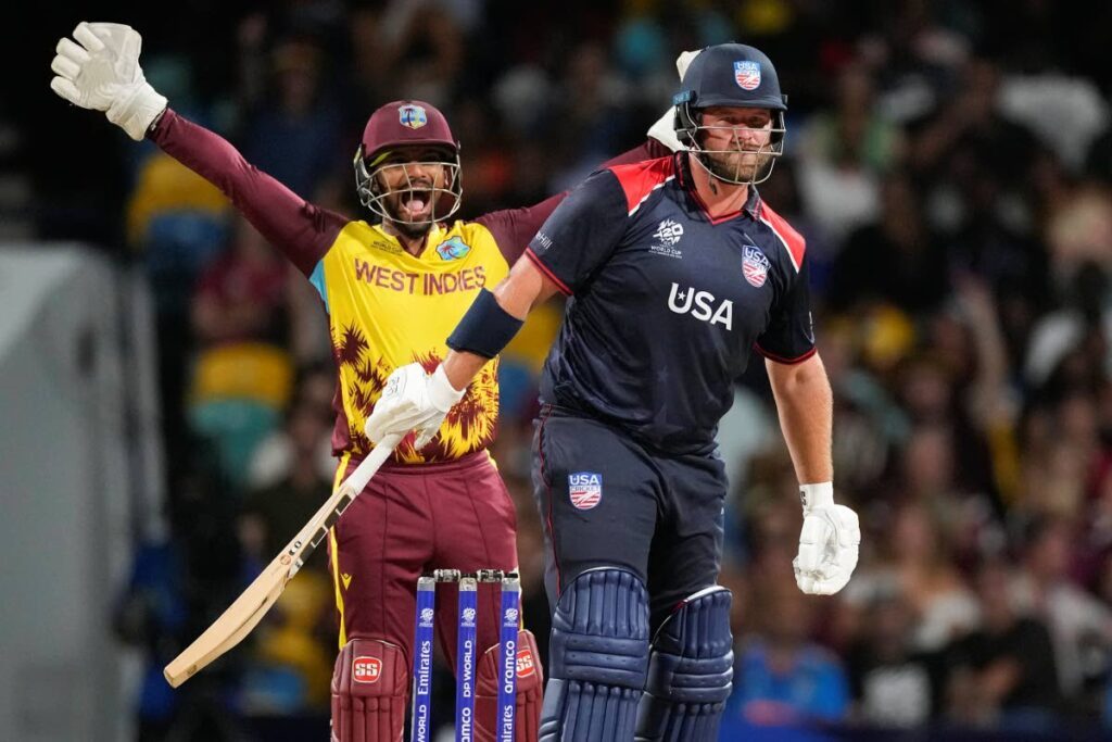 West Indies' Nicholas Pooran appeals for an LBW to dismiss United States' Corey Anderson (R) during the T20 World Cup match at Kensington Oval, Bridgetown, Barbados, on June 21, 2024. - AP PHOTO