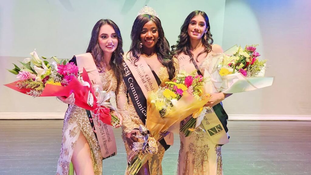 Three top delegates Miss Global International TT Nikeisha Garrette, centre, flanked by first runner up Kellisha Balkaran, left, and Aliyah Ali second runner up, right, held at SAPA San Fernando on June 23.  - 