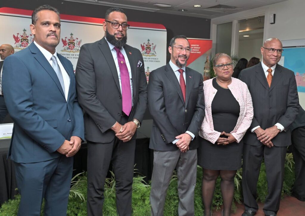 Edmund Subryan, acting president of NGC, left; Dr Joseph Ishmael 
Khan, NGC group chairman; Stuart Young, Energy Minister; Verlier Quan Vie, vice president, commercial, NGC and Howard Dottin, director, NGC, at the signing of the E&P licences on June 21.
- Photo courtesy NGC  