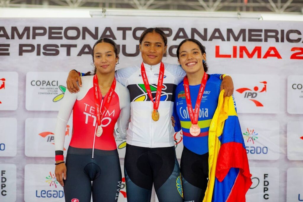 TT's Makaira Wallace, left, celebrates her women's sprint silver medal atop the podium at the 2024 Jr Pan Am Cycling Championships in Lima, Peru, on the weekend.  - 