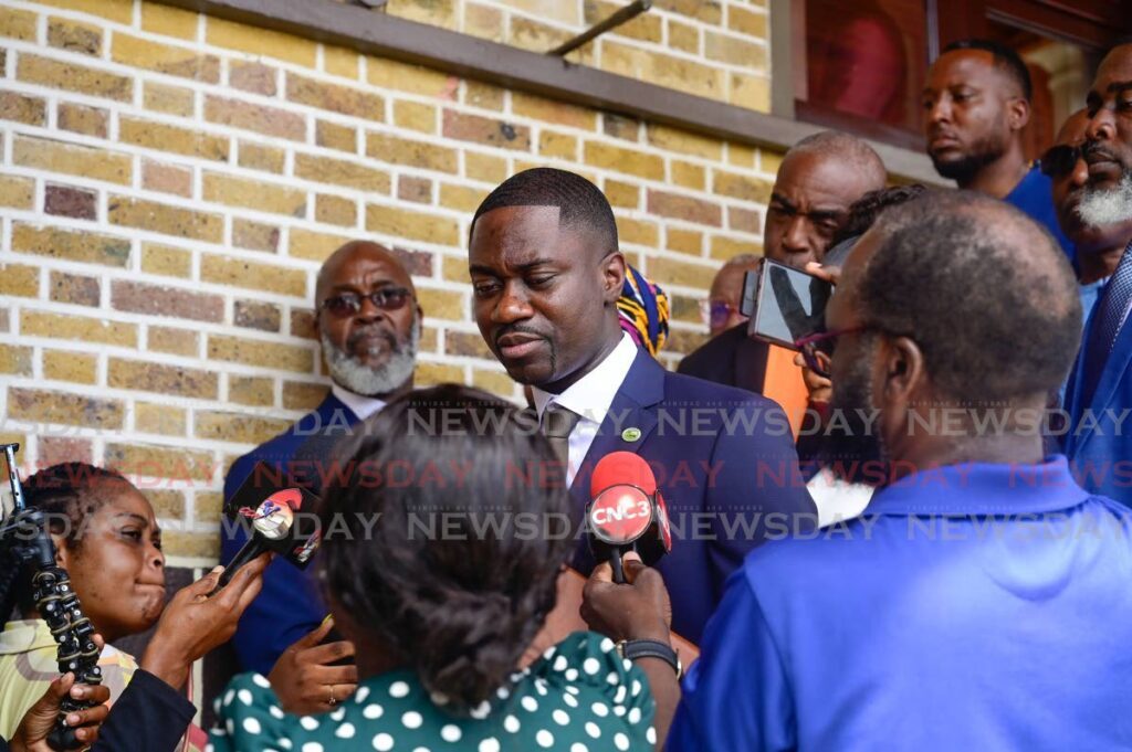 Chief Secretary Farley Augustine talks to the media outside the Assembly Legislature, Scarborough on Monday. - Photo by Caswell Gordon 