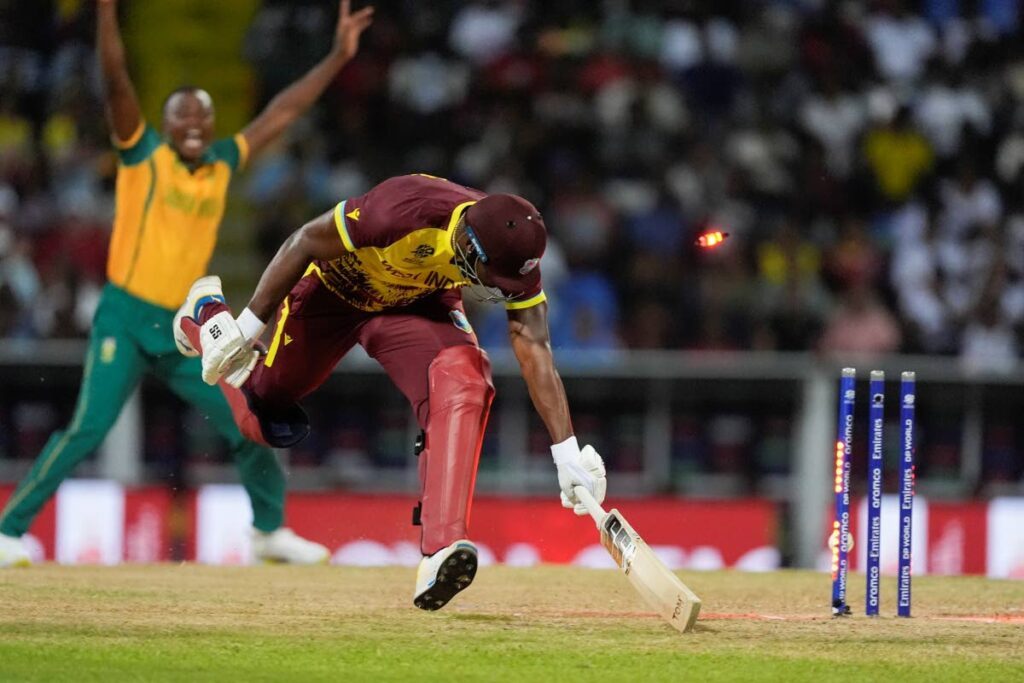 West Indies' Andre Russell is run out during the ICC Men's T20 World Cup Super Eight match against South Africa at Sir Vivian Richards Stadium in North Sound, Antigua on June 23. - AP PHOTO