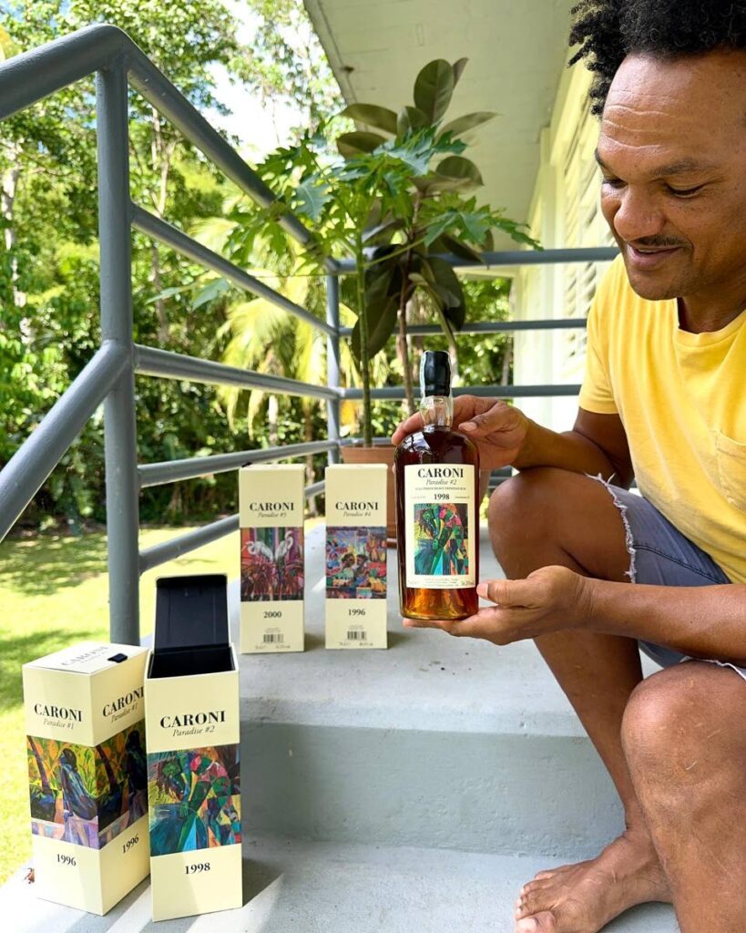 Artist Che Lovelace shows off his artwork which is being featured on the packaging of Caroni Ltd rums being sold by Italian/ French vintage rum firm, La Maison & Velier. - 