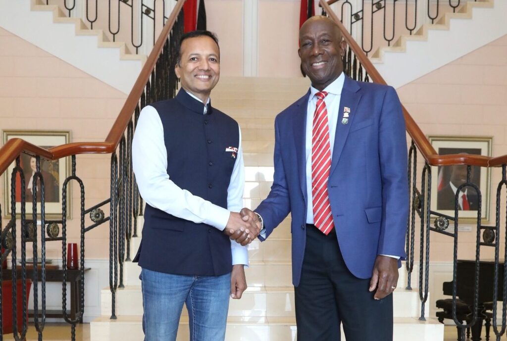 Prime Minister Dr Keith Rowley with Indian businessman Naveen Jindal on June 17 at the Diplomatic Centre, St Ann's. - Photo courtesy OPM