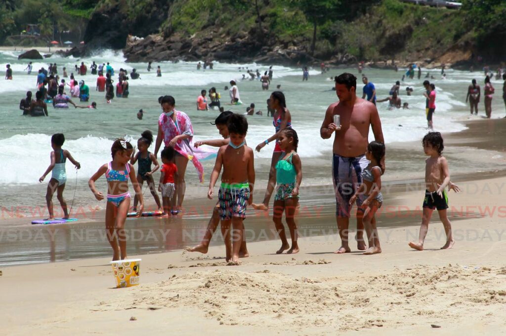 Beachgoers of all ages enjoy Maracas Beach in 2020. - File photo by Roger Jacob