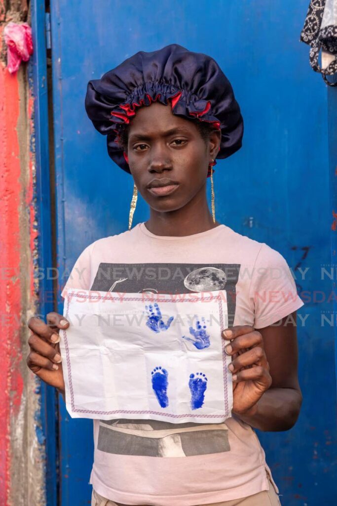 Akisha Bains, 30, mourns the loss of her third child little Jerel Bains who died at their Beetham Gardens home on June 13 - Photo by Jeff K. Mayers