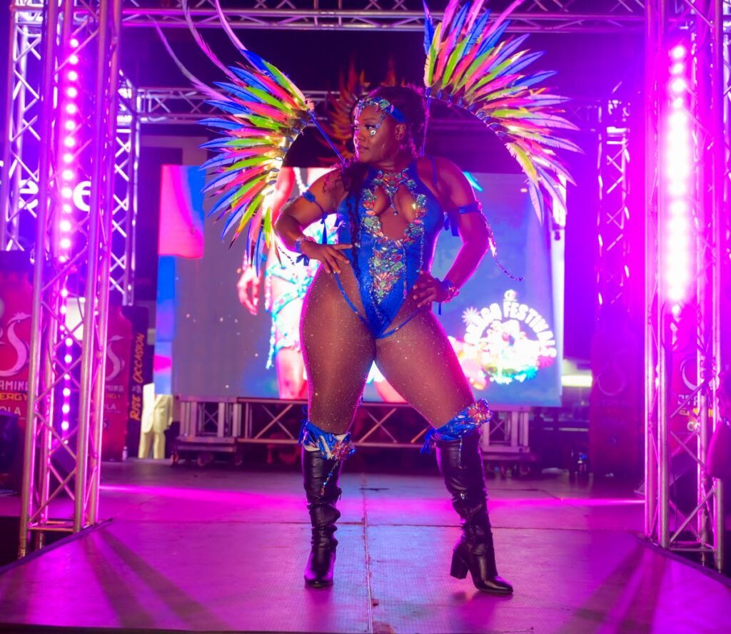 A female model displays a costume at the launch of Jade Monkey Bar’s 2024 Tobago carnival presentation Monkey See, Monkey Do. - Photo curtesy Caswell Gordon