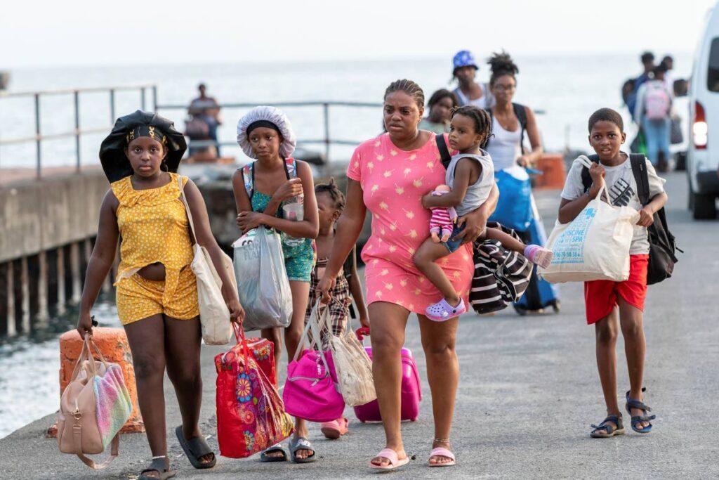 Evacuees from Union Island arrive in Kingstown, St Vincent and the Grenadines on July 2 after the island was hit by Hurricane Beryl on July 1. - AP PHOTO 