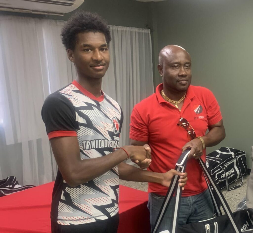 TT U-19 manager Kerwin John, right, and fast bowler Jacen Agard. 