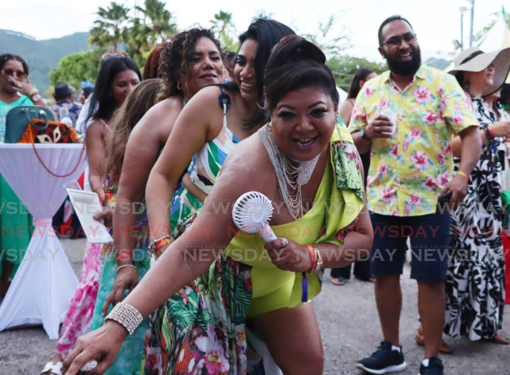 Partygoers enjoy themselves during the Garden Party.