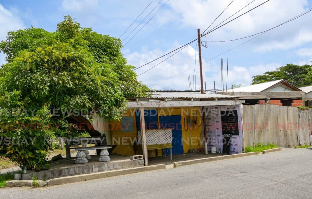 Three men were gunned down while playing cards outside this shop in Black Rock, Tobago on July 8. - Photo by Visual Styles 