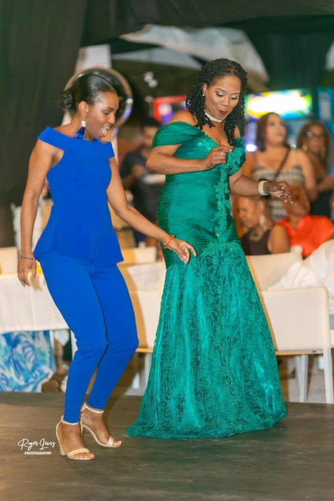 Jewel Holder, left, and parang queen Alicia Jaggasar on the dance floor at the Latin Fusion Music Festival at Estate 101, Maraval. - 