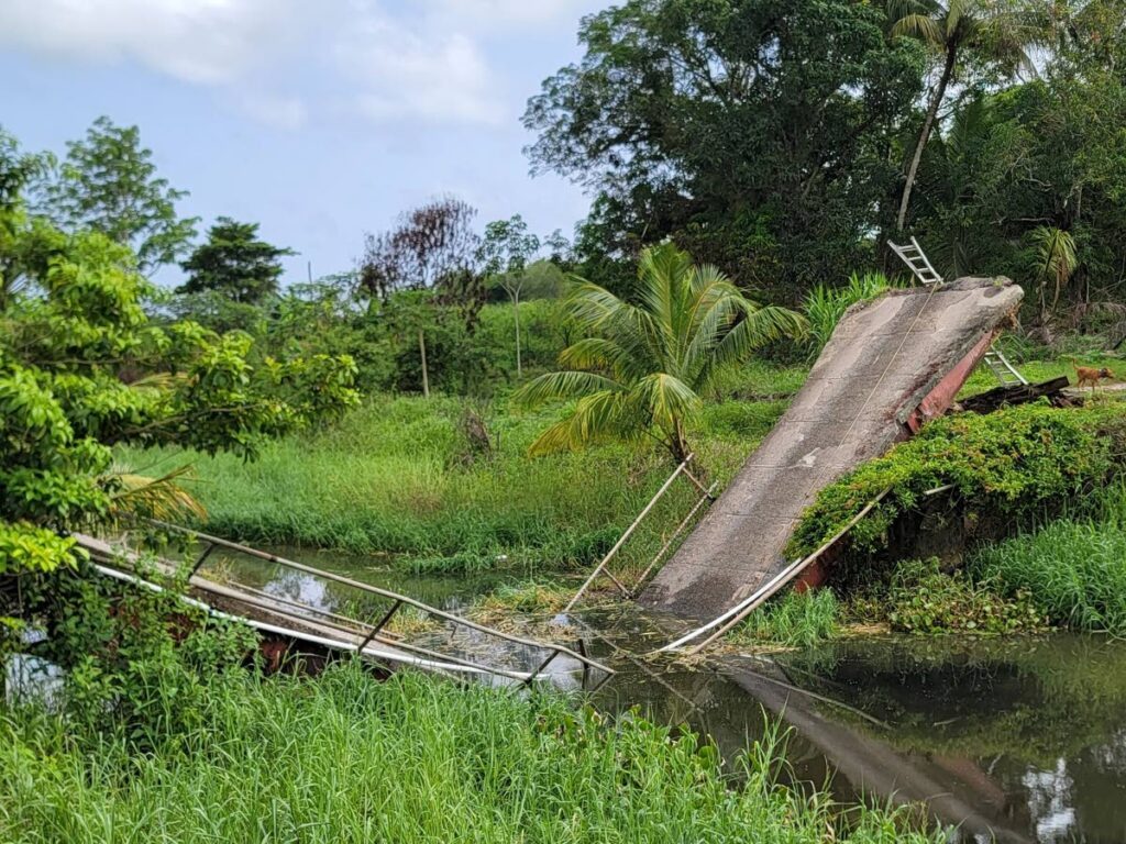The bridge that collapsed at St John's Branch Trace in Avocat on July 10. - Photo courtesy Dr Lackram Bodoe