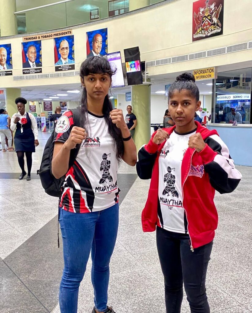 Muaythai fighter Crystal Mahabir, right, and coach Rebecca Bhola.  - Photo courtesy Trinbago Muaythai Association