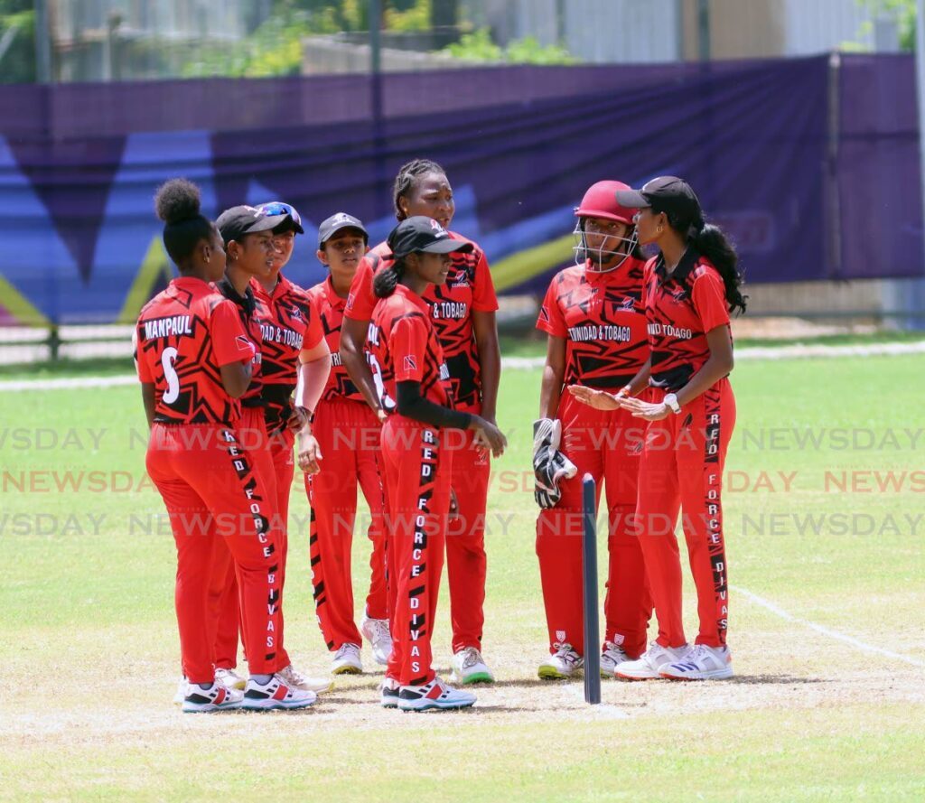 Members of the TT Women’s Under-19 cricket team gather against Barbados in a match on July 11 at the Diego Martin Sporting Complex. - Photo by Venessa Mohammed