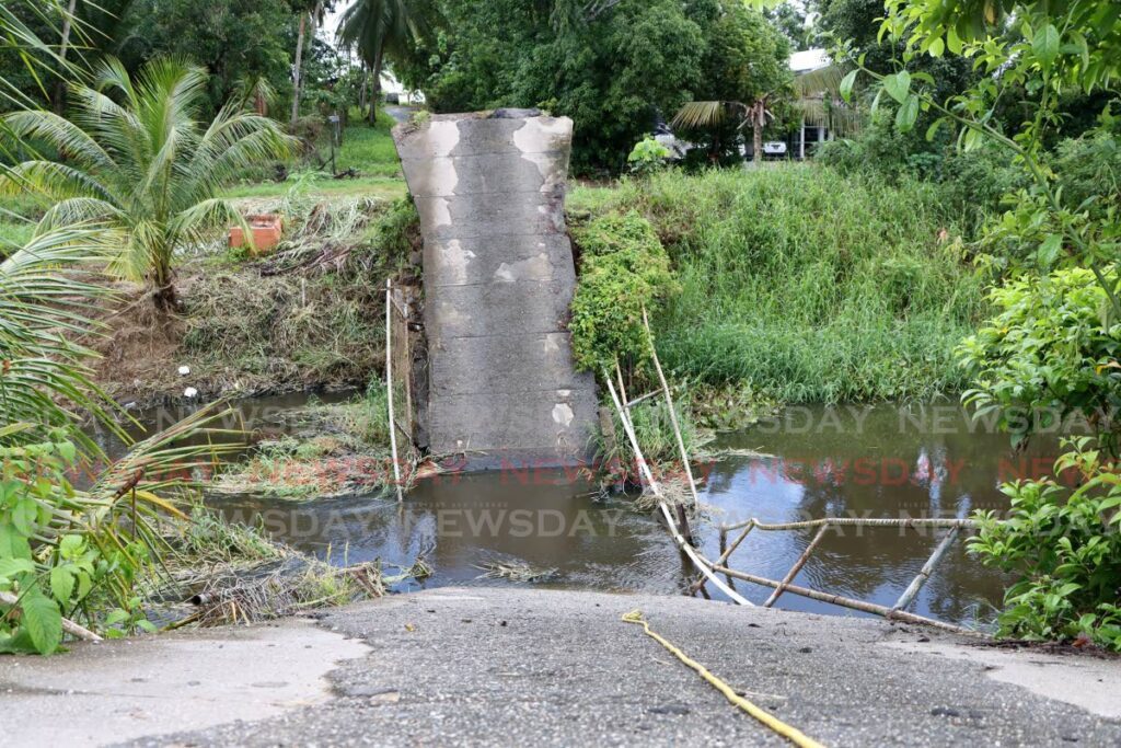 The collapsed bridge at St John's Branch Trace, Fyzabad on July 11. - Photo by Ayanna Kinsale