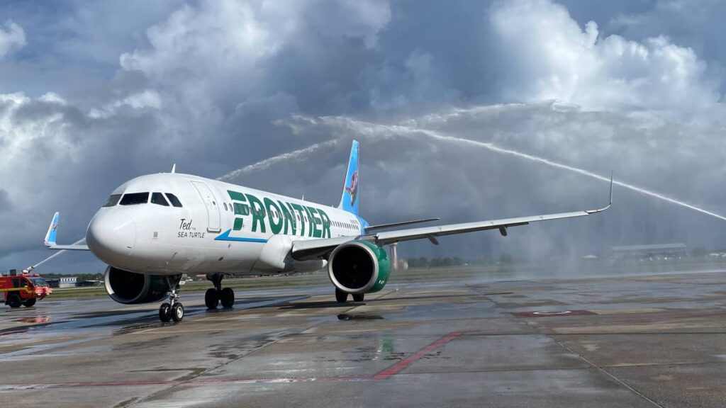 Frontier Airlines' Airbus A320-200 successfully lands after its first flight from San Juan, Puerto Rico to TT.
Photo courtesy Narissa Fraser - 