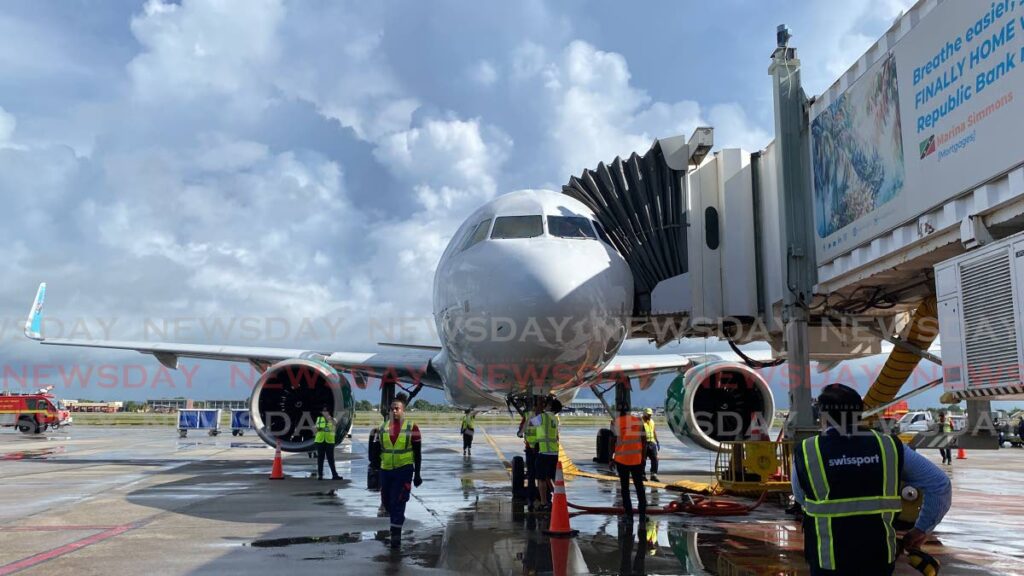 Frontier Airlines' Airbus A320-200 successfully lands after its first flight from San Juan, Puerto Rico to Trinidad and Tobago on July 11. 