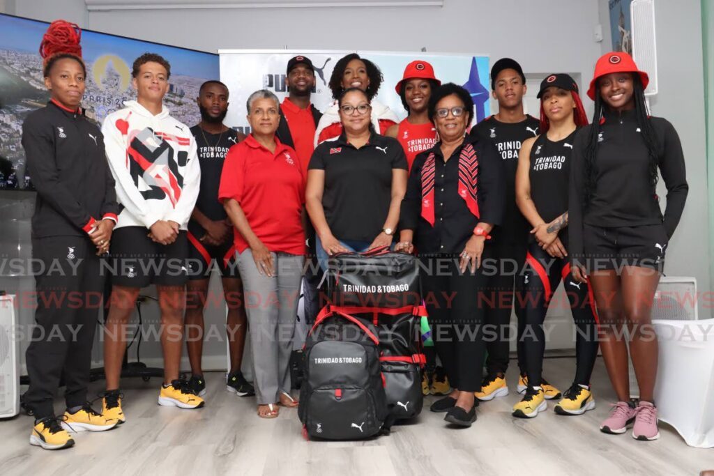 Olympic athletics sprinter Michelle-Lee Ahye, from left back,   along with fellow athletes Dylan Woodruffe, Elijah Joseph, Akim Bushe, Renele Forde, Kayla Julien, Andrew Pacheco, Tianna Guy and Shawnelle Williams, wearing the village wear, warm up, performance, competition, style and podium wear.
From left front are Diane Henderson, TTOC's president; Lovie Santana-Duke, Chef De Missíon; and Annette Knott, TTOC secretary general at the Official Paris 2024-TeamTTO Puma Gear Reveal at the Olympic House, Woodford Street, Port of Spain on July 12. The shoes the athletes are wearing are not part of the uniform. - Faith Ayoung