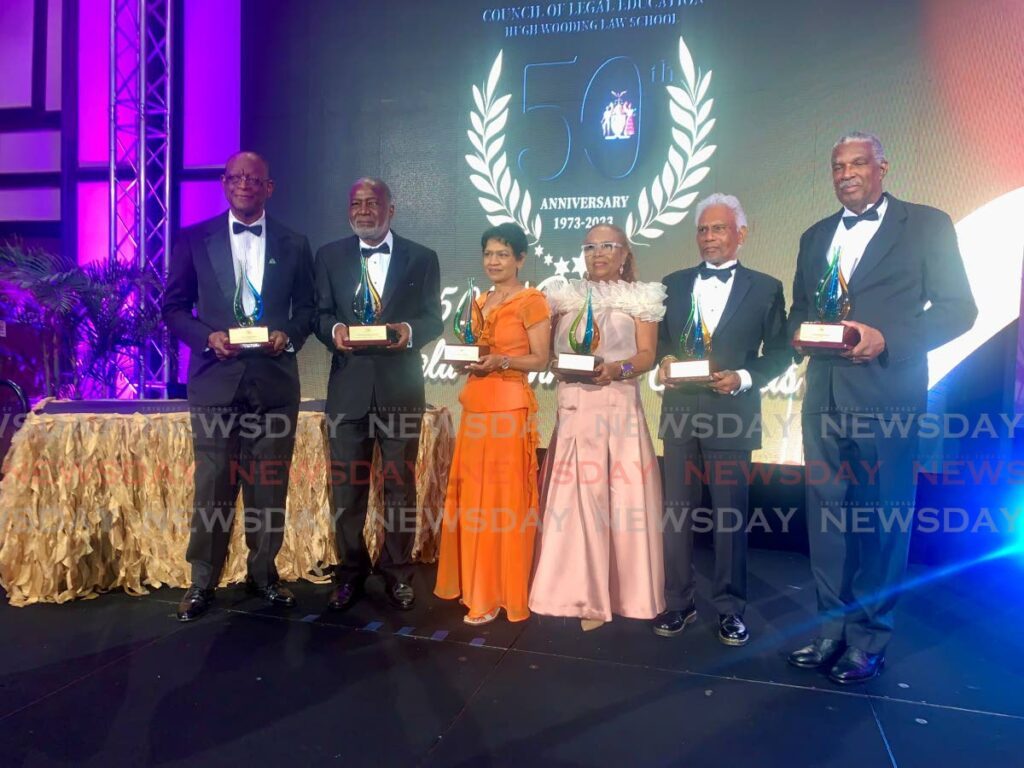 From left, Rolston Nelson, Andrew Brurgess, Susan Francois, Judith Sobion, Israel Khan and Kenneth Benjamin with their awards at the Hugh Wooding Law School 50th anniversary gala on July 13, at the Hilton Trinidad and Conference Centre, St Ann's, Port of Spain. - Photo by Darren Bahaw