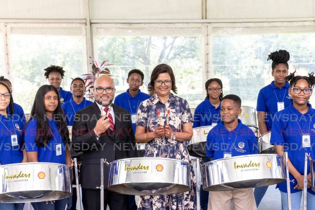 President Christine Kangaloo and her husband Kerwyn Garcia, SC, with camp participants at the launch of the first President’s Pan Camp at President’s House, St Ann’s on July 15. - Photo by Jeff K Mayers