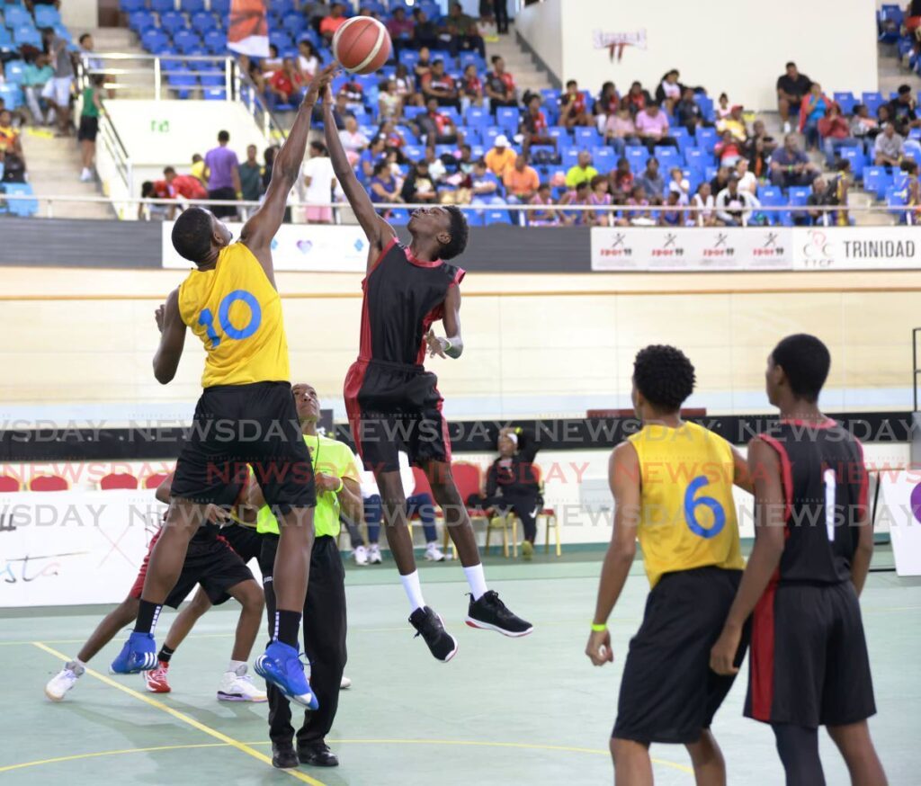 Action during the 2024 Basketball Fiesta between Elite Eagles (yellow) and 500 Hawks (black).  - Photo by Jeff Mayers